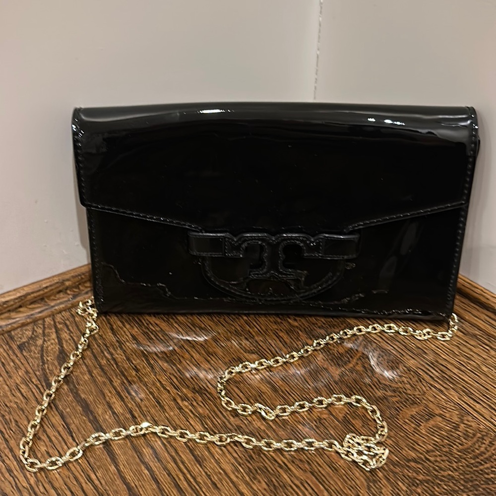 Tory Burch black patient evening bag.